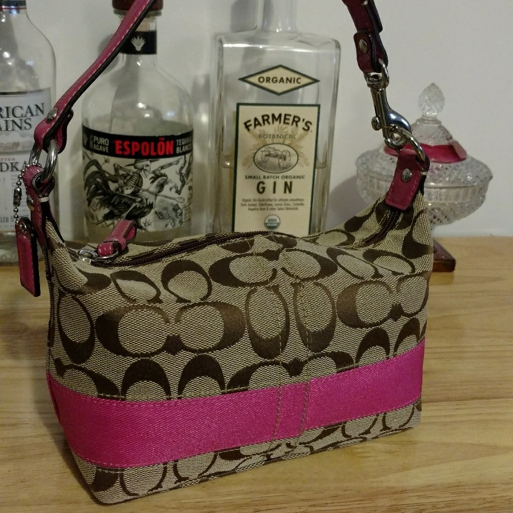 Coach signature and pink small handbag